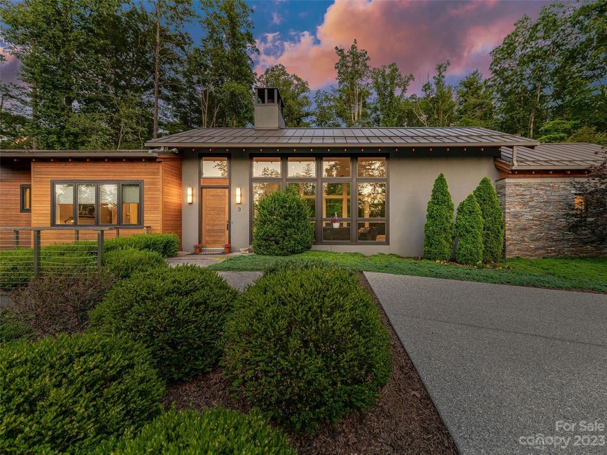 Fantastic mountain modern style home in superb location within The Ramble Biltmore Forest. Just steps from the Ramble's Living Well Center with outdoor saline pool, pickleball, tennis, bocce, gathering room, fitness center and more. Sleek details and open concept design with beautiful finishes inside and out. Rich textures in the great room, with lots of natural light to appreciate the beautiful setting. Plenty of room for family, friends and guests with five bedrooms, and four and a half baths. Primary bedroom on main level includes a private office, and there are additional options for office or recreation room space on the lower level. Large fully fenced backyard for kids and pooches to play. Pet friendly neighborhood, with miles of walking trails and numerous parks to enjoy.