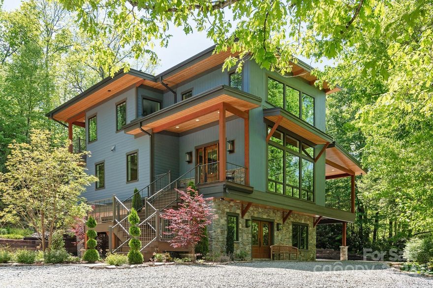 Like-New exquisite high-end home on 8 acres ON Green River. Owner spared no expense in finishes. Three Bedrooms +Office/Spare Room. Primary suite upstairs w/private balcony. 4 full baths. Heated Travertine flooring & copper sinks in all baths. Quartzite Soaking Tub w/underlighting. Separate studio/office/yoga room/VRBO w/exterior access & full bath. All GE Profile Kitchen appliances--42" frig. Blue Bahia granite kitchen island. Custom Kitchen cabinets w/inset doors.  Creston/Sonos 10 zone audio/video system. Standing Seam Metal Roof. Solid red oak flooring harvested from property used throughout. Sierra Pacific High Efficiency Windows. New Saltwater Hot Tub Spa included. Outdoor shower w/hot water. Exterior Valor Stainless Steel Fireplace on the Deck. Whole house 22kw Generac generator. 1000 gal. buried propane tank services. 32 x 40 detached garage with 2 large roll up doors. Main house has drive through garage. Over 400 feet of access to Green River and access rights to Lake Summit.