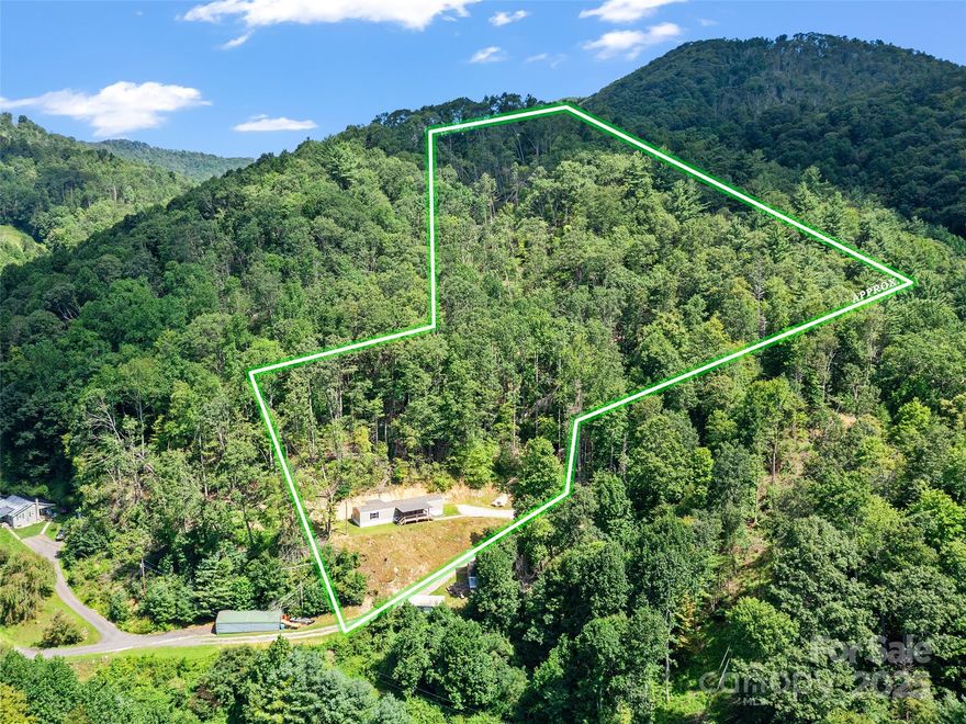 Mountain views and a move in ready home with additional acreage for building or recreation. This well maintained practically new mobile home sits on 6.825 acres (per survey) with a year round mountain view as well as a fall and winter view of Roan Mountain. This is a perfect opportunity for a first time home buyer, someone wanting to build their dream mountain cabin with a fantastic view and have a place to live while doing so or anyone seeking the peaceful solitude of a mountain home. Situated in the gorgeous Buladean community, home is private while also being just 5 minutes or less to the community center, Dollar General and Hopson's store. 20 minutes to Walmart in Unicoi and 20-30 minutes to Johnson City. You really must check this one out if you have been waiting for an affordable home. 
Barn and outbuilding with their additional acreage to be included upon request with an acceptable offer.
A permanent foundation is being installed at this time and listing will be updated once it is complete.