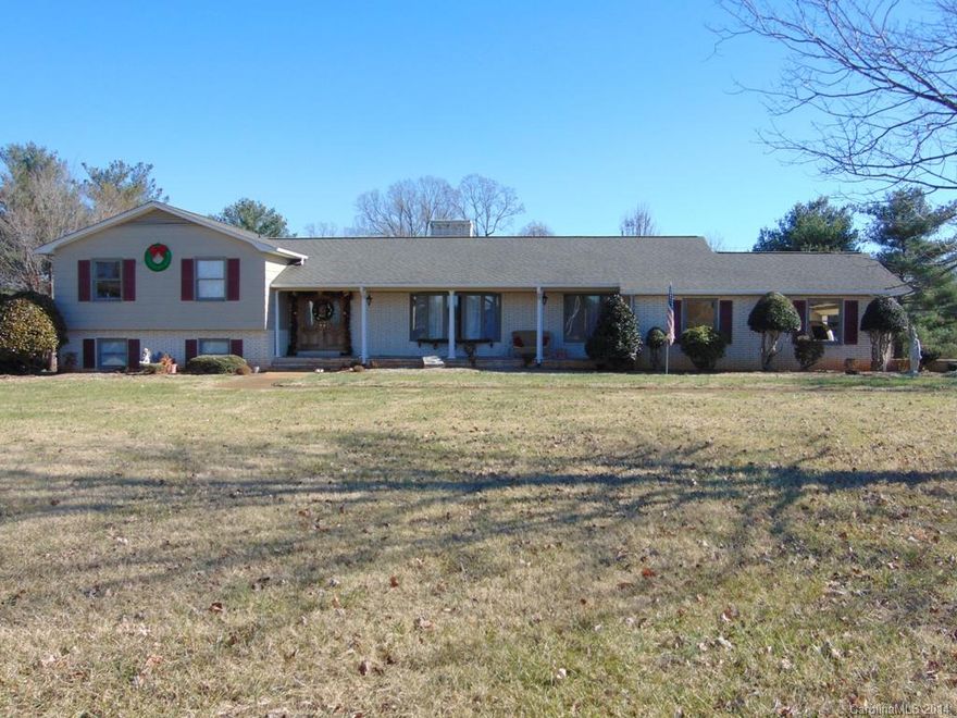 Tri level Spacious Brick home with 4+ acres of land, pasture, and HUGE barn on property...Bring your horses...after riding...enjoy relaxing evenings in the sunroom or summer nights on the patio or upper deck entertaining.  Lower level offers a separate living quarters complete with kitchenette and fireplace in the living room and separate entrance.  Large rooms and HUGE kitchen perfect for entertaining your family & friends...Not your typical 4 bedroom home....additional parcel of land incl.