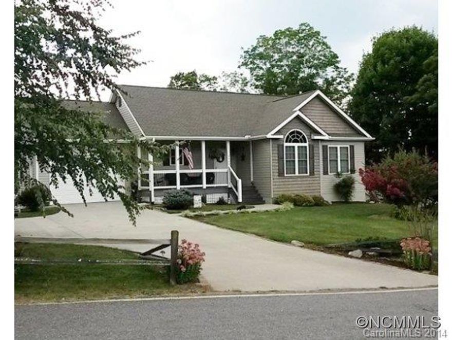 Charming custom home w/open floor plan featuring 9 ft. ceilings. Spacious LL w/separate entrance. Lots of possibilities! Has single garage on main level and a 2nd single garage plus large workshop not included in total SF. Lovely yard, gently sloping to creek. Comes with outdoor concrete pad with water and electricity for shed. Seller will pay up to $1,000 in Buyer's closing costs with an acceptable offer. LA is related to seller.