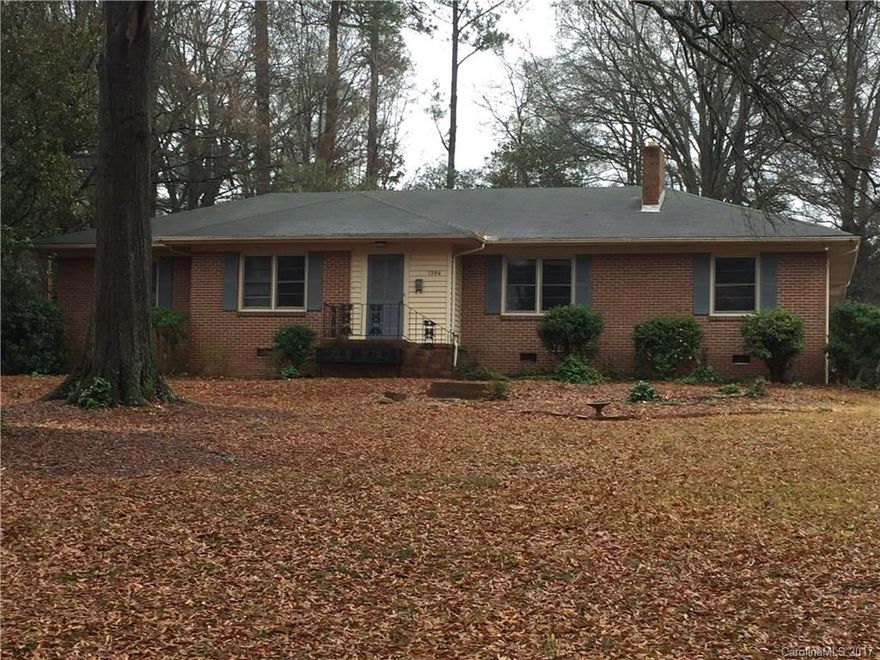 Hard to find one level ranch with four bedrooms, two and half baths on large lot in Rock Hill near Winthrop University.  Original hardwoods run through most of the house.  Fourth bedroom could be used as an office.  Backyard patio opens onto large, fenced backyard with lots of privacy.  New HVAC 2009 and new hot water heater 2014.  Close to schools and in a great neighborhood.  Home is being sold ‘as is.”  Seller to make no repairs.