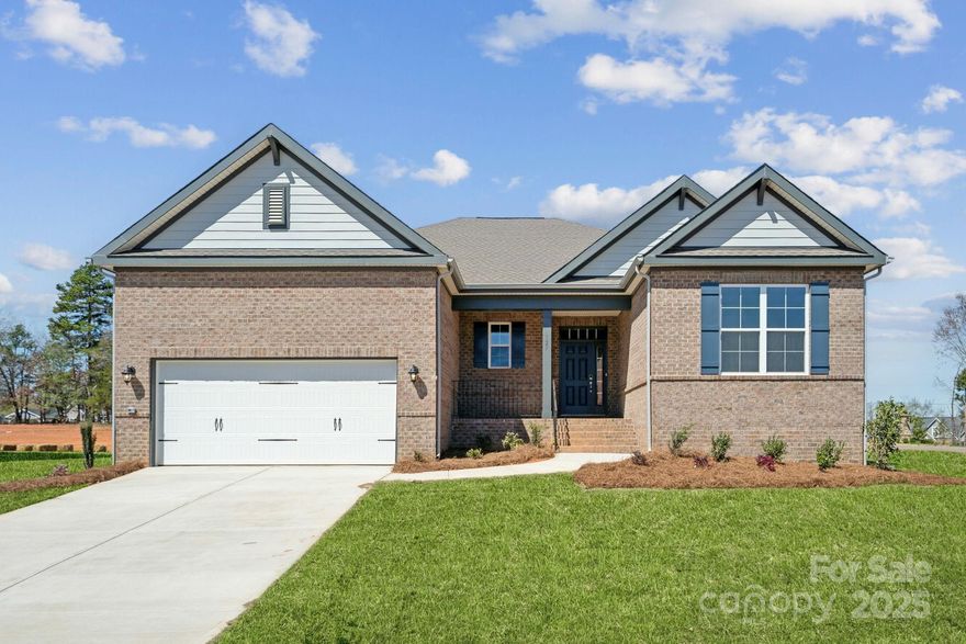 Welcome to this stunning 3 bedroom ranch. This immaculate home boasts a gourmet kitchen with top of the line appliances, perfect for entertaining and culinary enthusiasts alike. The spacious layout includes a versatile flex space that can be tailored to suit your lifestyle, whether as a home office, gym, or playroom. This property offers spacious indoor living and vast outdoor greenery. Don't miss this exceptional opportunity to live in style on nearly an acre of land.