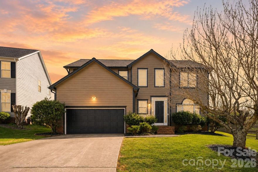 Welcome Home to 4704 Lone Tree Court, located in the established community of Devonshire with convenient access to I-85, I-77, and I-485. Entering the 2 story foyer, you are greeted by plentiful natural light, a modern office space to the right and an updated 1/2 bath for your guests. The main level also includes a two-story great room with a gas log fireplace, a formal dining room, and a fully renovated kitchen. The updated kitchen features new lighting, a farmhouse sink, granite countertops, tile backsplash, stainless steel appliances, and a natural gas range. Upstairs, a generous landing leads to the primary bedroom, featuring vaulted ceilings and freshly updated master bath. The master bath updates include tile flooring, updated dual vanity with quartz counter top, bidet toilet, and an oversized custom tile shower with duel rain heads, washing wand and Bluetooth speakers in ceiling. Do not worry, the windows have privacy shades as well as the windows are tinted for your privacy. The upper level also offers two additional bedrooms, a second full bath, and a dedicated laundry room. Outside, you can enjoy lush landscaping, fully fenced back yard, and large retractable awning for some great shade. Be sure to checkout the heated/cooled garage space with freshly coated flooring, high end storage cabinets, tool boxes, large work benches, and overhead storage space as well. Notably, this home is situated in a neighborhood where a Greenway expansion is slated to pass through the woods behind the property, once completed it would provide direct access to a variety of outdoor activities. Dining, shopping and entertainment options nearby. Thoughtfully updated and meticulously maintained, this home is ready for its next chapter.