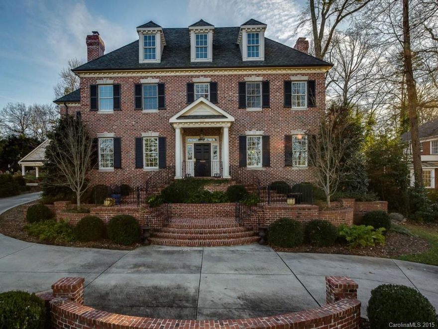 Elegant brick Georgian on large, private lot. Stunning formals, gourmet kitchen w breakfast area, butler's pantry, wet bar and large family room. Impressive master suite w 2 walk-in closets and spa bath. All bedrooms have private baths. Full office on main level, 3rd floor bonus room. Covered rear patio w fireplace. Detached 2 car garage w finished exercise room and full bath above. Private back yard with extensive landscaping.