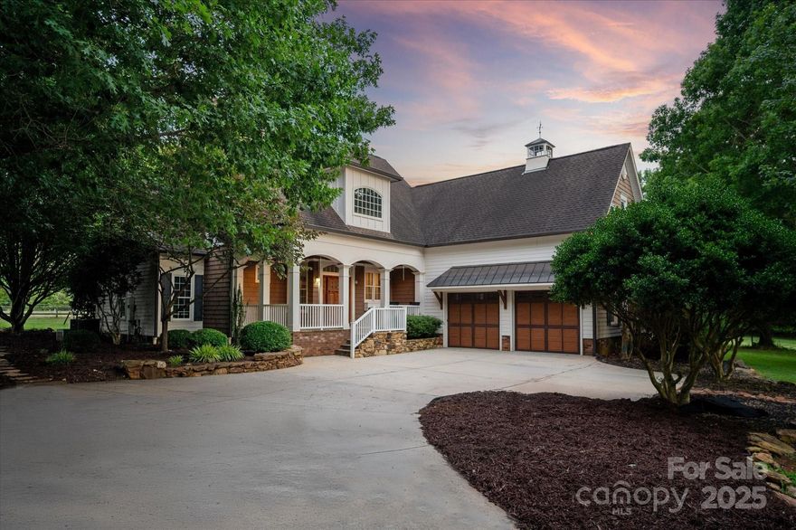 Lovely farm home situated on 8.6-acre offers a rare opportunity for equestrian living w/ no HOA restrictions & just 5 MINS to downtown Waxhaw. Sits on beautifully maintained land with mature oak trees, fenced pastures, and direct access to nearby horse & walking trails. Equestrian features include a 5-stall barn, lighted riding arena, and multiple outbuildings including a chicken coop and equipment sheds perfect for horse lovers or those who want a hobby farm. The home features a remodeled kitchen w/ newer cabinetry, upgraded countertops, stainless steel appliances, & a gas range with hood. The interior has been freshly painted & includes updated lighting. The main level offers a guest bedroom w/ a full bath, a powder room, & views of the private backyard. Upstairs includes a beautiful primary suite w/ a custom walk-in closet, two additional bedrooms, a full bath, and walk-in storage. Take in the beautiful NC weather from the second story screened porch or the lower level covered porch