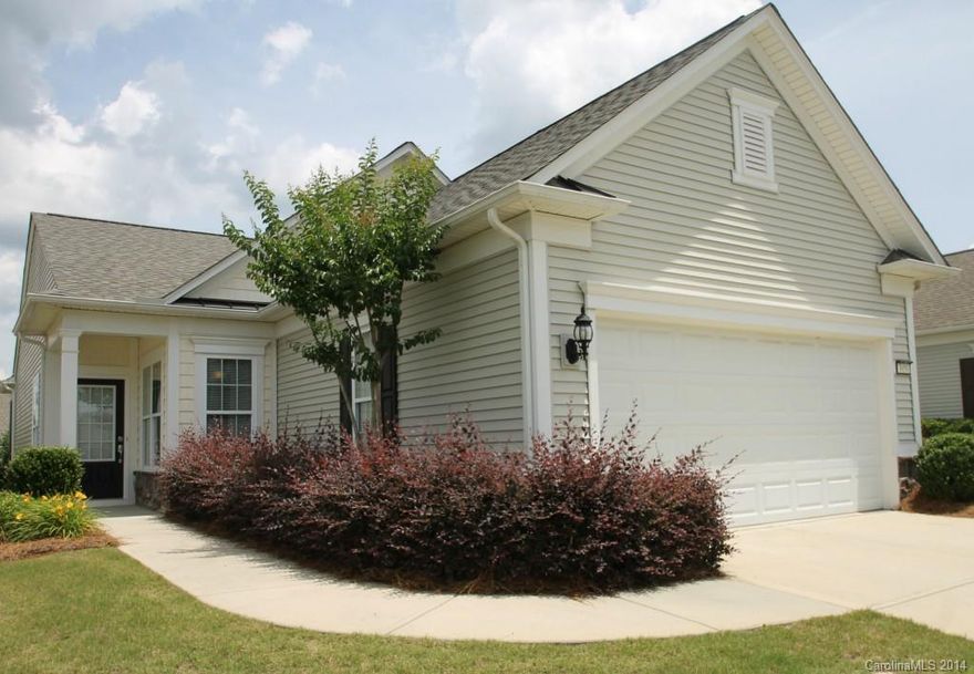 Immaculate Brookside 2BD/2BA Model with Bright and Sunny Interior on Private Lot! Charming Kitchen has Maple Cabinets, Corian Countertops, Pantry, and Breakfast Nook. Hardwood Floors and Tile Throughout. Screened Porch with Double Ceiling Fans Leads to Patio! Upgraded Landscaping! Amenities Galore in this Active Adult Community!