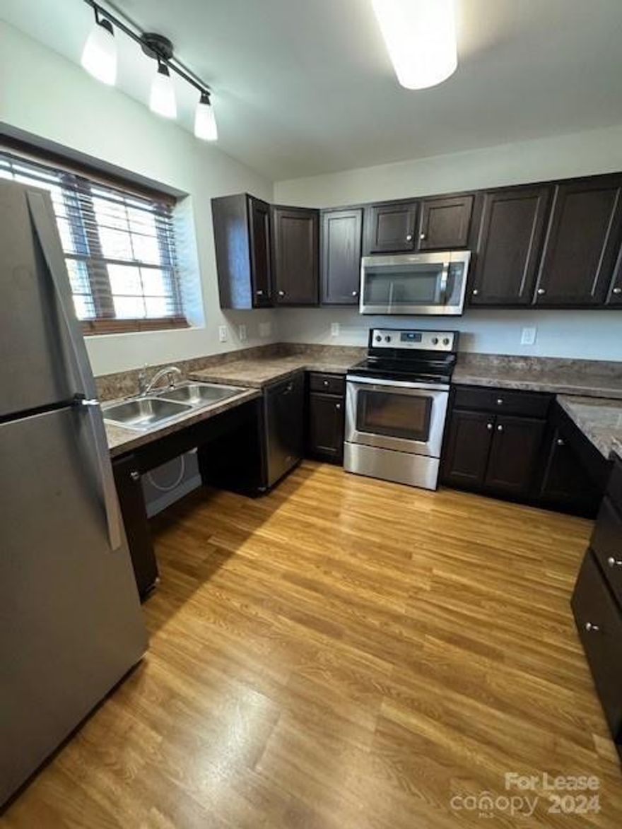 A MUST SEE!! This beautiful townhome is located in the town of Taylorsville.  This home has 2 BR and 2 BA with a lovely large kitchen.  Open floorplan has nice living and dining spaces.  Off of the living space you will find an extra room that could be a sunroom or home office.  There is a nice outdoor space for your convenience.  Located 25 minutes from Hickory.