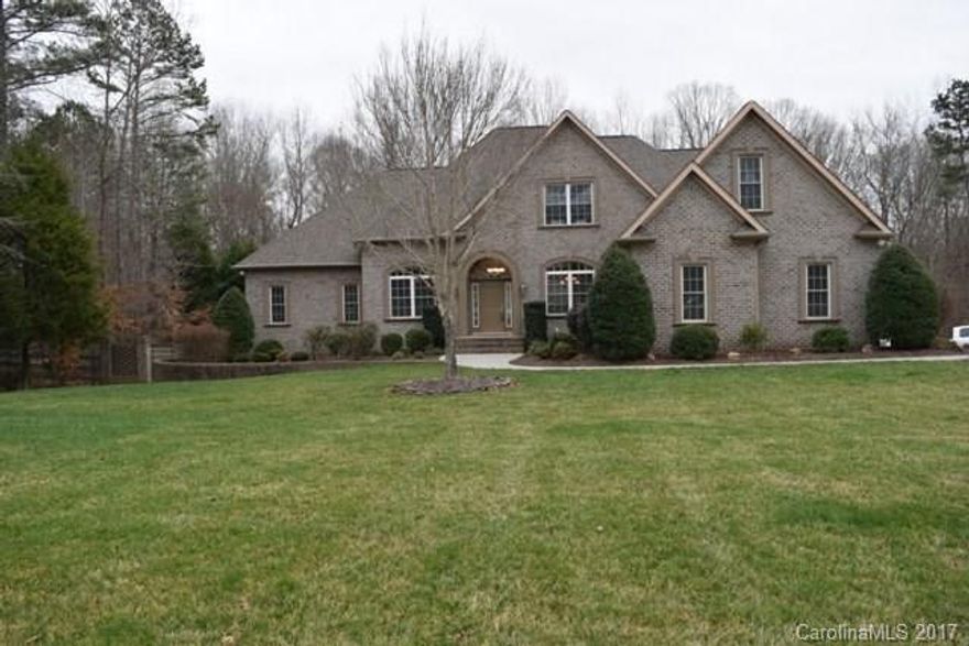 Looking for the wow factor? This unique custom build with 5 car garage has it all. This Huntington Farms home  features an incredible floorplan and is situated on a large 1.08 acre cul de sac lot.  Many architectural details through out. Large bedrooms with deep closets, two on the main, two on the second level, and one full bedroom on the lower level.  Total of 5 bedrooms.  Fully finished basement slash mancave has some surprises in store for a growing family in need of extra living space!