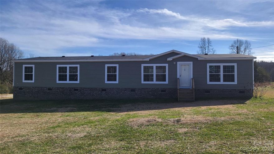 Spacious home on a  beautiful piece of land in the Buford school district. Brand new carpet and freshly painted throughout.