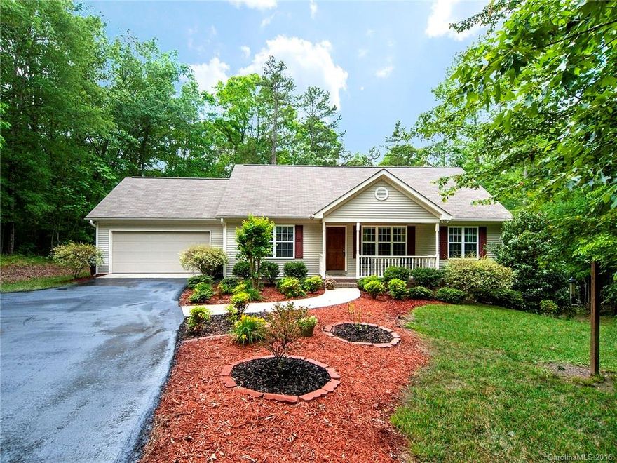 This ranch home is built on a walk out daylight basement.  Double the size of the home by finishing the basement! It is already plumbed for a bathroom.  You enter the home into a charming large living-dining area.  There is a french door out onto a rear deck overlooking a lovely backyard and trees.  The front of the house has a charming rocking chair porch.  It has a split floor plan with the master on one side and the guest bedrooms on the other.  The master bedroom has its own en suite.