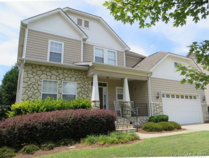 Charming craftsman style home in the award-winning Clover School district! Kitchen has tons of cabinet/counter space, ss appliances & built-in desk. Refrigerator included. Spacious Great Room has fireplace. HWs thru main living areas. Master Suite offers a deep WIC & private bath w/ garden tub. Wonderful outdoor living space with large rear deck and fenced backyard. Enjoy the community pool, tennis & walking trails.