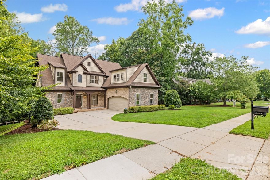 BACK ON THE MARKET - At no fault of Seller!!  Here's your chance to make this gorgeous executive home yours!! Located in The Landing, this beautiful home has SO MUCH to offer and plenty of space for all.  You'll fall in love with the very private Primary Suite featured on the main level and overlooking the peaceful wooded backdrop of this home.  Some additional features include: Two stunning fireplaces, quality crafted tray ceilings, quaint built-ins, beautiful bay windows, and cozy window seats. Fully finished walkout basement features a stacked-stone wet bar with granite countertop - a perfect space for entertaining with a billiards room, poker area, an additional living room, a reading nook, and also a space for a murphy bed!!  Basement also features a full bathroom with walk-in shower.  There is also another garage space on this level - perfect for a workshop, home gym, indoor batting cage, or golf simulator!!  Upstairs features a generous bonus room with oversized walk-in closet.  Perfect as a 5th bedroom or another flex/living area. Semi-enclosed and very private, moderate backyard, great for entertaining or enjoying some gardening, minus the burden of extensive yardwork. Main level features an oversized 2-car garage which has additional space for your toolbox and/or golf cart.  This highly sought after community features walking trails, playground, gated pool, clubhouse, sidewalks, golf-cart friendly, and easy access to the lake. This home also sits within the highly desirable Clover School District. Close to popular restaurants and shopping. Book your private showing today and let's make this your new address!!