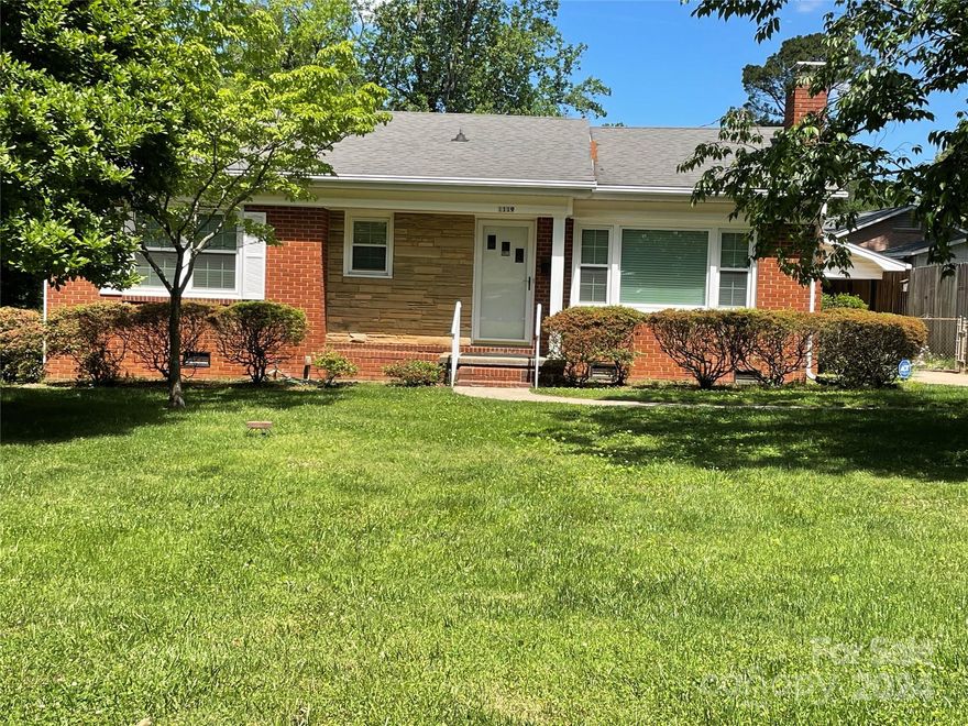 A charming and well-maintained ranch home with great curb appeal is just waiting for your fresh touches and updates! This 3 bedroom, 2 bath brick home has been lovingly cared for through the years by one owner & features all new windows within recent years, a new HVAC (2021), gutter guards, a carport, a workshop w/ electricity, a covered porch, a chair lift between the tiered porch levels, new wiring throughout the whole house & workshop, & a shed in the fenced backyard. A large living room as well as a dining area open to the kitchen & another living space offer fantastic spaces to entertain a crowd. Original hardwoods are under the carpet. Renovate the kitchen & baths to make it your own!