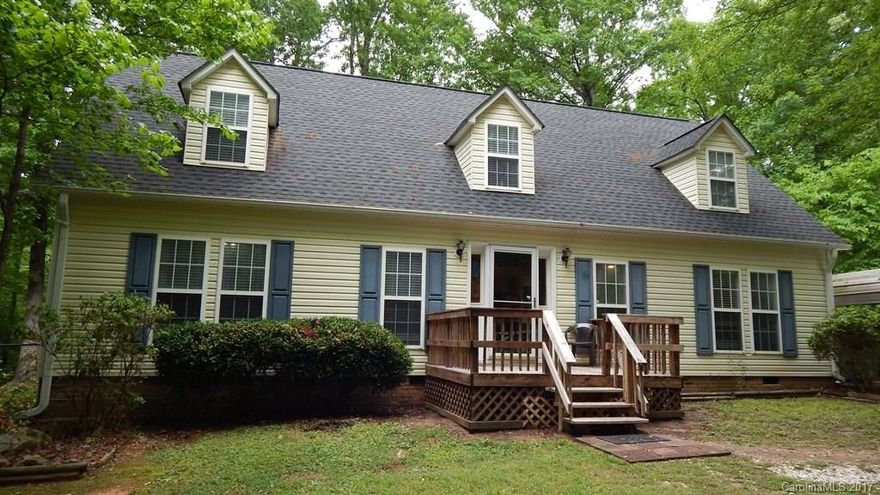 Cape Cod home in the woods, but close to everything Fort Mill has to offer. New carpet, paint & laminate flooring. 1st floor master retreat w/Claw foot tub & separate shower. All appliances stay, new stove & rest no more than 2 yrs old. Large bonus upstairs. New furnace, hot water heater & whole house water purification system. Property back sup to 23 acres w/creek & waterfall. Fenced backyard. No HOA's. Hurry, won't last long.