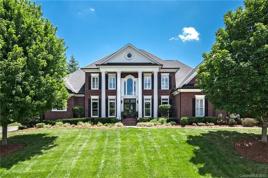 Hard to find expanded Amherst plan with Master down PLUS additional guest room suite! Mostly hardwood floors on main level, stairs and upstairs hallway.Gorgeous Great Room features gas fireplace with stone surround,built ins and HUGE fixed glass windows!Spacious kitchen w/TONS of cabinet space,double ovens and large island. Private backyard features screened porch,large paver patio and dedicated gas line to grill.Upstairs includes 3 secondary rooms plus 2 BONUS rooms!Custom Plantation shutters!