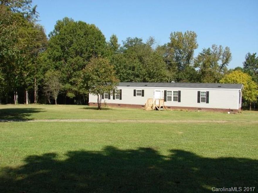 Cute as can be with 2.43 acres to roam!  Waterfront on 7 acre pond, beautiful and private.  Move in ready with open floor concept, built in shelves and at the end of a cul-de-sac.