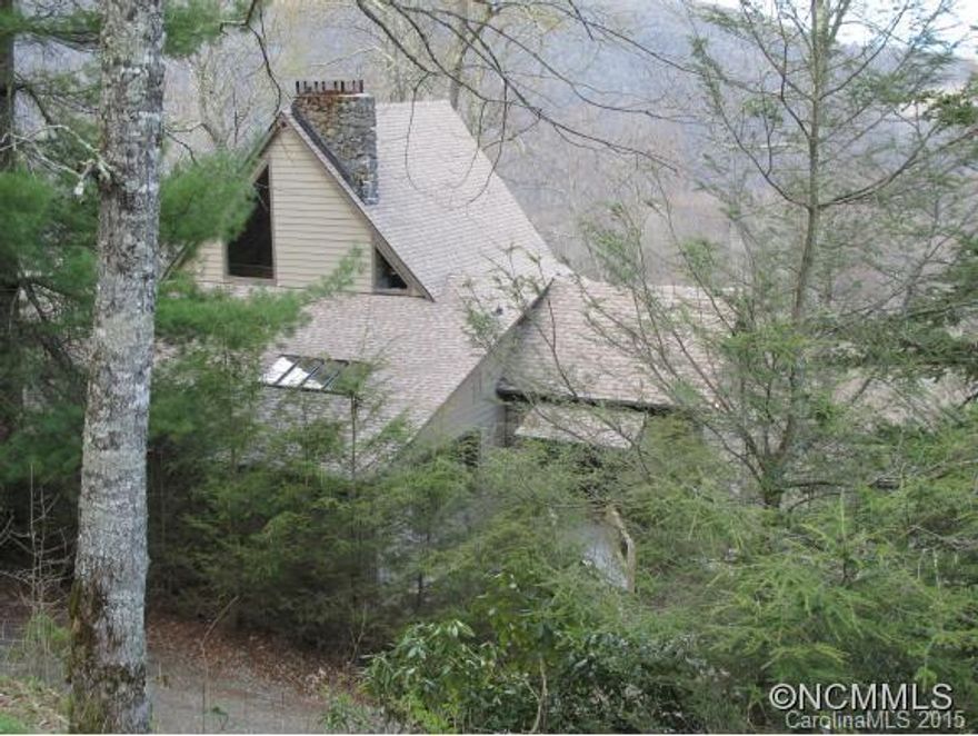 Tax Value $823,440. Payoff to bank is even higher.  SHORT SALE offered at $448,950! Views are priceless. This 4,400 sq/ft spectacular home with 35+ mile views was totally renovated and upgraded in 2007. Views of Grandfather Mountain and multiple layers of mountain ranges. A master BR suite on both levels, plenty of room to entertain family and friends, huge great room with giant fireplace, and fireplace in the kitchen! PENDING BANK APPROVAL