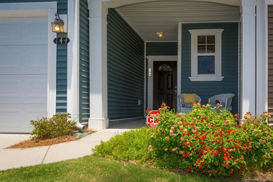 Granite countertops, hardwoods, new carpet on main, and new stainless steel appliances! Lots of cabinet and counter space plus pantry! Neat, clean and move in ready!  Maintenance free living with easy access to I-77. Covered front porch, 1 car attached garage, covered rear porch, privacy behind AND exterior storage! Large WIC in master, large bedrooms, & 2nd floor laundry. Well maintained, close to pool, shopping and dining!  Come see for yourself!