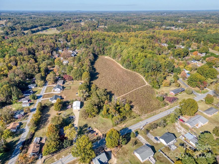 Prime Location - Exceptional Investment Opportunity! 24.23 Acres of Land – Already rezoned for 48 townhomes! This incredible property is located in one of the most sought-after areas and presents a rare chance for developers and investors. Whether you're looking to create a thriving residential community or capitalize on the rapidly growing local economy, this land has everything you need. Key Features:Rezoned for 48 Townhomes – All the groundwork is done, saving you time and money. Annexed into the City of Landis – Enjoy city water and city sewer services, reducing infrastructure costs and enhancing appeal to future homeowners -Prime Location – Just minutes away from new Target developments, restaurants, shopping, and entertainment, providing convenience and lifestyle benefits for future residents. Future Growth This area is booming with new developments, making it a prime spot for residential expansion.Easy Access – Close proximity to major highways, schools, and community amenities.