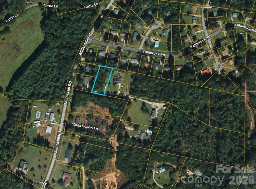 Discover the potential of this 0.51-acre homesite nestled on Dula Hollow Ln in Lenoir, NC. This gently sized parcel offers a great opportunity to build your dream home or invest in land in a peaceful, rural setting. With road access and a manageable lot size, this property is ideal for a primary residence, vacation getaway, or long-term investment. Enjoy the privacy of country living with easy access to nearby highways for commuting to Hickory or the surrounding areas.