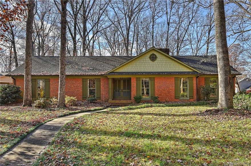 Gorgeous, quiet in-town all brick ranch!  Large rooms, beautifully refinished hardwood floors throughout the house.  Enclosed sunroom heated, can be opened for screened porch.  Large corner treed lot with side load driveway.  New Roof, New Paint inside and out, New appliances.  Leaf guard system and rain barrel collection. Great location - short commute to uptown Charlotte, Southpark. Rama Road and Sardis Swin Clubs close by, membership required.  Fireplace sold as-is, no known problems.
