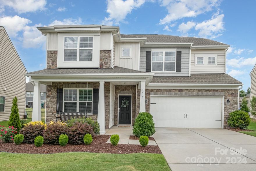 This move-in ready 5 bed, 3.5 bath home in Waterside at the Catawba offers luxurious living. The open concept floor plan is perfect for entertaining and features a modern kitchen with granite countertops, stainless steel appliances, walk-in pantry and breakfast bar that seats 5+. The kitchen flows seamlessly into a spacious breakfast area and a light-filled living room with a cozy gas fireplace. The main floor includes an office, a formal dining room and half bath. Upstairs, the primary suite is a true retreat with a spa-like bath including a soaker tub, oversized shower, and large walk-in closet. Room for everyone upstairs with four more bedrooms, 2 full baths, and laundry room. The two-car garage with EV charging station, flat backyard surrounded by trees, and access to community amenities such as a pool, clubhouse, sport courts, playgrounds and walking trails make this home a must-see. New carpet, fresh paint, designer lighting and more! OFFER DEADLINE: JULY 14TH @ 3PM