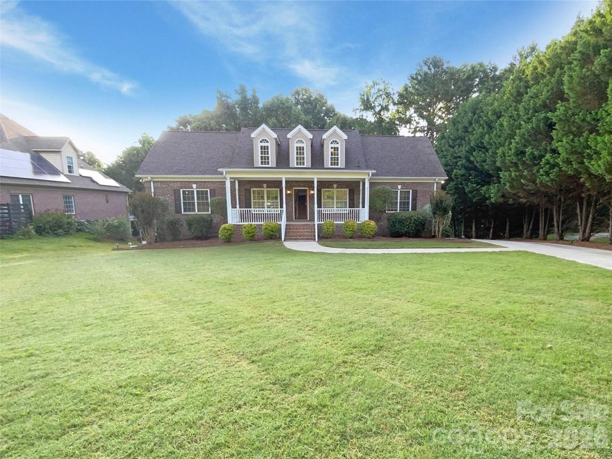 Warm, welcoming, and full of flexible living space, this classic brick 4 bedroom, 4 bath home offers a floor plan that truly fits the way you live. A covered front porch invites you in, where you’ll find a comfortable main level featuring a primary bedroom and bath, a cozy fireplace, a dedicated office, and a second main-floor bedroom. The spacious kitchen is designed for gathering, with stainless steel appliances and plenty of room to cook, connect, and entertain. Upstairs, a roomy loft provides the perfect bonus space for a media room, playroom, or reading nook, along with two additional bedrooms. The finished walkout basement expands your options even more, offering a rec room, kitchenette, a non-conforming bedroom, and an additional bath— ideal for multigenerational living. Step outside to enjoy a large deck and extended patio overlooking the backyard, creating great indoor-outdoor flow for relaxing or hosting. A 2-car tuck-under garage at the back adds convenience and storage to complete this inviting home. 100-Day Home Warranty coverage available at closing.