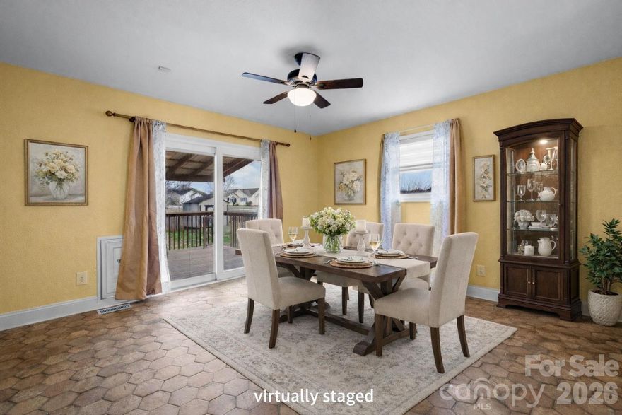 Space! Space! Space! This home has all the room you've been wanting with 3 bedrooms, 3 bathrooms, and 2,570 sq ft. The main level features a living room with a cozy fireplace, a dining room, and a spacious kitchen with stainless appliances (refrigerator included) and a pantry for extra storage. There is also a convenient laundry area off the kitchen with the washer and dryer. The primary suite has its own private bath, while two additional bedrooms share the main bath. Downstairs adds even more versatility with a den, an office (could be used as an additional bedroom/septic permit 3 bedrooms), a flex space, and a full bath — perfect for today’s changing needs. You’ll also appreciate the oversized 572 sq ft garage with room for cars, toys, and hobbies. Plus there is a large deck overlooking the fenced backyard, and a built-in pet door so your furry companions can head out to play. With so much space and a sensible layout, this home checks the boxes. Reach out to schedule your private tour.