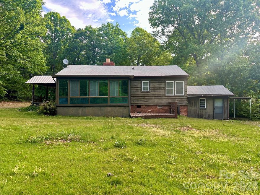 Tucked away behind mature trees on a private drive, this charming property offers the perfect blend of privacy, space, and convenience. Situated on 1.83 acres in a desirable Dallas location with no city taxes, this home provides a peaceful setting while still being just a short drive to US Hwy 321 for easy access to surrounding areas.

This 3 bedroom, 2 bathroom home features a warm, cozy rustic charm throughout, creating a welcoming and comfortable living environment. The layout offers functional living space, highlighted by a spacious primary suite with a large master bath, providing a relaxing retreat.

Outside, you’ll find a fenced-in yard perfect for pets or outdoor enjoyment, along with multiple storage buildings offering ample space for tools, equipment, or hobbies.

Whether you're looking for a private place to call home or a property with room to spread out, this one offers the space, setting, and location that are getting harder to find.