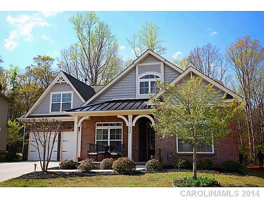 Simply beautiful open and flowing Ranch home with spacious light filled Bonus & full bath on upper level!  Extensive upgrades with wide plank hardwoods, tray ceilings, designer back splash, furniture grade cabinetry, granite, & stainless steel.  Elegant Master Suite on main level with raised dais sitting area.  Premium private fenced wooded setting strolling distance to amazing amenities!