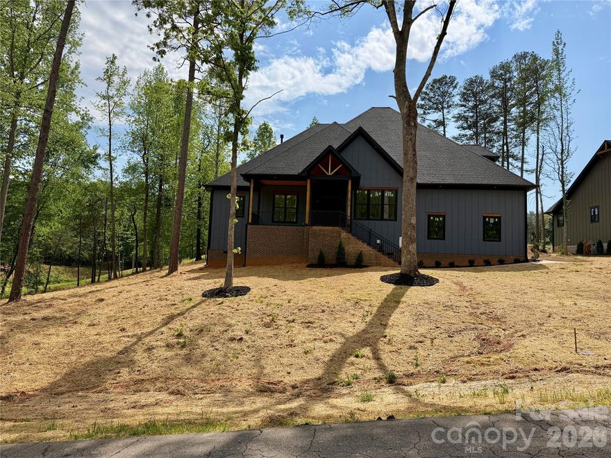 Beautiful new construction home perfectly positioned on the River Oaks Golf Course, offering stunning views and exceptional craftsmanship throughout. This thoughtfully designed 1.5 story home features a split bedroom floorplan, providing both privacy and functionality. The spacious, open concept kitchen flows seamlessly into the living area, creating the perfect space for entertaining. Enjoy generously sized bedrooms with walk in closets. This home has impeccable attention to detail at every turn. Upstairs, a versatile bonus room with a full bathroom and closet offers the flexibility to be used as a fourth bedroom, guest suite, or private retreat. Step outside to the expansive covered back porch and take in the incredible golf course views, an ideal setting for relaxing or hosting guests. This home effortlessly blends comfort, style, and scenic surroundings in one exceptional property.