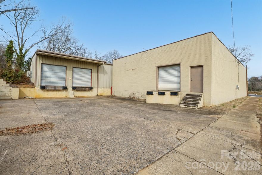 Small General Industrial – 6,794 SF Warehouse with Offices. Excellent opportunity to own a 6,794 square foot brick and metal constructed industrialbuilding ideal for warehouse, distribution, light manufacturing, or contractor operations. This facility offers a functional layout combining warehouse space with dedicated office areas. Property features include 3 dock doors and 4 roll-up doors, providing efficient loading and unloading capabilities. The site offers paved concrete parking, along with access to city water and city sewer, making it move-in ready for a variety of business uses. The seller has recently upgraded the property with two new mini-split systems and a new furnace, improving comfort and efficiency. As an added bonus, the seller will include a 2000 Chevy box truck with approximately 43,000 miles in the sale — a valuable asset for delivery, logistics, or service operations. This versatile industrial property offers strong functionality, solid construction, and immediate operational potential.