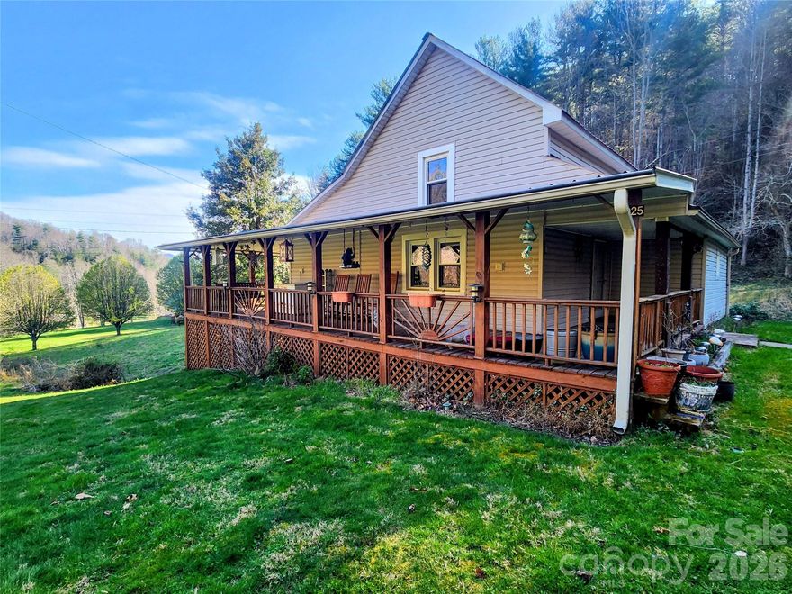 Tucked away in the mountains of Western NC you will find this beautiful farm that consists of 16.85 beautiful acres. The property includes a small farm house that has updated windows, Metal roof, newer stainless steel appliances in the kitchen. The home offers two bedrooms and one full bath, there is low ceiling heights throughout the home and therefore is not counted in the total square footage. The home is serviced by a spring reservoir for the water source. The home is being Sold As Is Where IS. There are multiple creeks on the property. The acreage offers long range mountain views, cleared pasture land, multiple buildings including a large run in shed for livestock or hay storage, one large tobacco barn that is currently being used for storage. Located approx. 30 minutes to Marshall and less than One hour to Asheville. Bring your house plans and imagination and make this beautiful property your own!