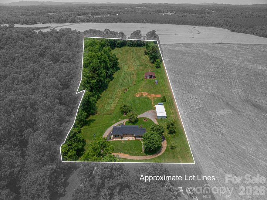 Looking for your own slice of rural living or a mini farm? This property could be exactly what you’ve been searching for. Situated on 6.37+/- acres, the property offers plenty of space for animals, gardening, and enjoying peaceful country life.

The barn on the property was previously used as a horse barn with multiple stalls, and the materials to convert it back to a working barn are still on site, making it easy to reestablish horse stalls if desired. The back portion of the property was once fenced for horses, and electricity is already connected to the barn. Whether you are considering horses, cows, goats, or chickens, there is ample room to create the setup that fits your needs. A stream, natural spring, and well water located near the barn help provide convenient water access for animals.

The current owner uses the shed for vehicle storage, but it could easily serve as hay storage, feed storage, or space for tractors and farm equipment. There is also plenty of room to plant a garden and grow your own vegetables, making this property ideal for those seeking a more self-sufficient lifestyle.

Also located on the property is a three-bedroom, one-bath brick home that has been in the same family since it was built in 1958. The home features a generously sized living room and dining area, offering comfortable space for gathering with family and friends. While some updates may be desired, the home has been well maintained over the years. A new roof was installed in 2024, and the bathroom floor was replaced in late 2025. There is also space that could potentially be used to add a small second bathroom or half bath.

Additionally, a second septic tank is located on the property, which previously served a manufactured home and could offer possibilities for RV parking or extended family use.

If you’ve been dreaming of country living with room to grow, this property deserves a look. Relax on the front porch in the evenings, enjoy the peaceful surroundings, or watch the sunset from the back patio. It’s hard to beat the quiet and comfort of a place like this to call home.