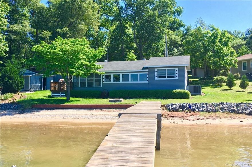 LAKEFRONT 2BR 1.5 BATH CABIN, PRIVATE BEACH, COMPLETELY REMODELED. CUTE AS A BUTTON. BEAUTIFULLY DECORATED; FURNISHED PRICE NEGOTIABLE.