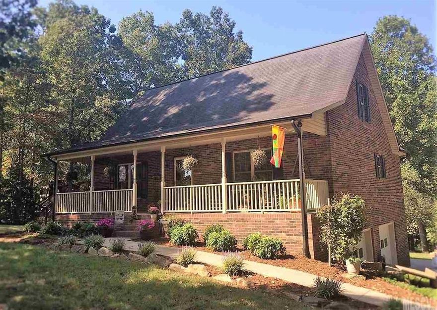 Impressive 1 1/2 story custom built brick home! 3BR, 2.5BA loaded with extras. Sitting on almost 4 acres. Country feel but close to town. Hardwood throughout main floor, large LR w/gas logs & rock FP. DR, breakfast nook & pretty galley kitchen. Main level master with WIC, sep. shower & soaker tub, ceramic tile in all baths, laundry on main. 2 Bedrooms upstairs, hall bath and lots of walk-in attic storage. Partially finished room in basement used as a workshop, double garage. Full length front porch with porch swing, custom built fire pit, adorable tree house. Large storage building, grape vines room for garden, private backyard, wooded areas, and pretty landscaping! Don't miss this one!