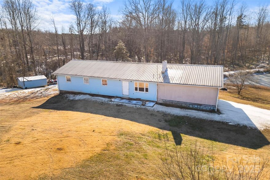 Looking for endless potential and opportunity in the heart of Landrum? This 4bd/2ba home is situated on 12.72 acres with its own private pond.  This 1988 home has all the bones to create whatever masterpiece suits your vision, with 1693 sqft on the main level and another 1500 sqft of unfinished basement.  A flex room off the carport is not heated/cooled and will add another 354sqft.  All bedrooms and bathrooms are on the main level, as well as the carport entrance.  The basement has a separate door and garage door to help with large equipment storage.  Don't miss this opportunity to make this your home! This home is being sold "as-is".  Inspection report and pest inspection have already been completed and will be attached in associated documents for your review.  Additional parcel 1-14-00-003.27 (1.31) acres located adjacent to listed property can also be combined with the 12.72 acres if buyer desires.  Currently owned by one of the Sellers.