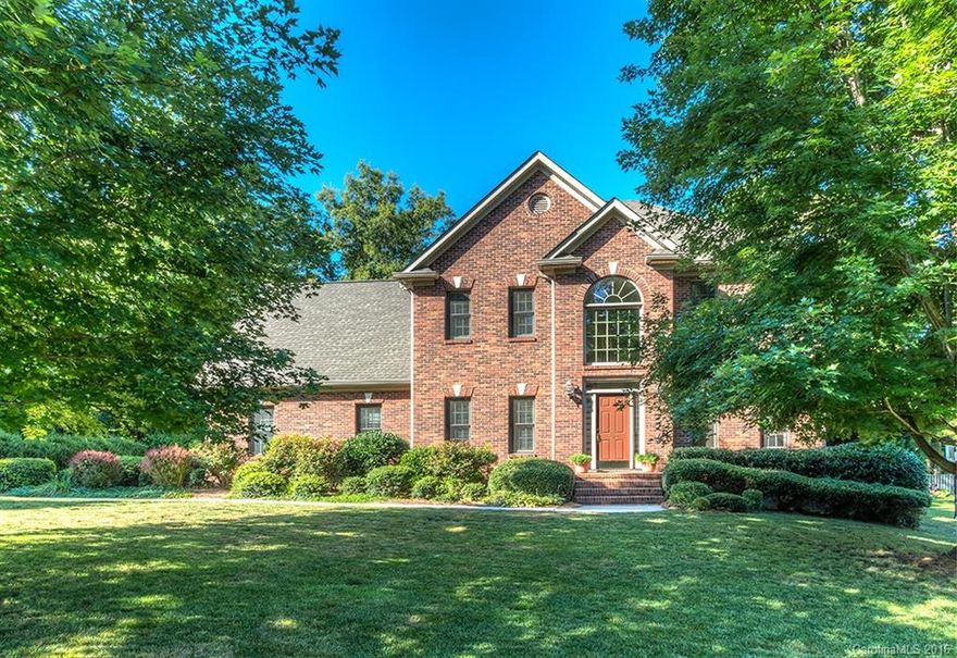 You've got to see this one!  Beautifully maintained, 2 story, full brick home w/4BR (4th/bonus) & 2.5baths, formal DR & LR/Office; hardwoods, Kitch w/granite counters w/gorgeous stone backsplash & stainless appl; family rm w/fireplace; Amazing sunroom & deck overlook private backyard, walking distance to schools, close to shopping, restaurants, hospital, etc.  1 yr warranty. Buyer/Agent to verify all pertinent info necessary in the decision making process; i.e., SqFt, zoning, age, lot size, etc.