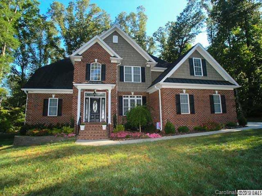 APPROVED Short Sale! Gorgeous custom home w/heavy moldings throughout. Amazing kitchen with elaborate cabinetry, granite counters, etc. Master suite w/tray ceilings and huge walk-in closet. 2+ bonus rooms upstairs. So much space and tons of storage space. Beautiful private lot. (Photos show Stove but Stove and Refrigerator have been removed. Neither are included.)