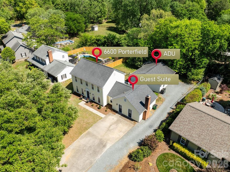 Tucked away in one of South Charlotte’s most convenient pockets, this truly one-of-a-kind property at 6600 Porterfield Rd redefines what it means to find a “unicorn.” With a rare combination of versatility, income potential, and thoughtful updates—and no HOA—this is not just a home, it’s an opportunity.

The main residence features 4 bedrooms and 3 full baths and has been uniquely configured to function as two separate living quarters. Ideal for short-term rental or multi-generational living, one side offers a 3-bedroom, 2-bath layout complete with its own kitchen, laundry, and private access, while the other lives as a fully independent 1-bedroom, 1-bath suite with its own kitchen and laundry as well.

Beyond the main home, a fully detached accessory dwelling unit (ADU), built in 2018, expands the possibilities even further. This 3-bedroom, 2-bath residence includes its own kitchen and laundry, creating a third completely self-sufficient living space on the property.

Altogether, this property functions as three distinct income-producing opportunities—whether for short-term rentals, long-term tenants, or a private compound for extended family and guests. It has a proven track record as a successful income-producing property, making it an exceptional option for investors or those seeking a flexible living arrangement.

Recent updates throughout the property include fresh interior paint, modern light fixtures, matte black hardware, white kitchen cabinetry, new quartz countertops, and new carpet—delivering a clean, updated aesthetic that appeals to both homeowners and guests alike.

Located just minutes from the Greenway, Ballantyne Bowl, and the Carmel area, with easy access to I-485, this home combines privacy with unbeatable convenience. Zoned for highly sought-after schools and surrounded by everyday amenities, the location is just as compelling as the property itself.

Opportunities like this are exceptionally rare—three living spaces, no HOA restrictions, and unmatched flexibility all in one. Don’t blink…this unicorn won’t last.
