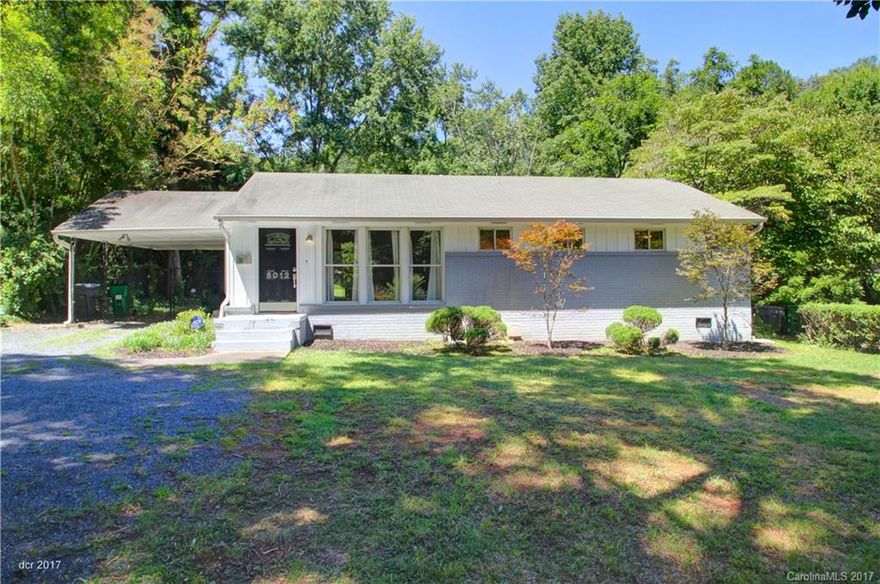 Updated throughout: refinished hardwoods, new paint, newer countertops, & appliances. Large fenced backyard, carport, relaxing deck, & shed. Enjoy one of the largest lots in Madison Park at .53 acres with no maintenance - lawn care included in rent. Energy efficient windows. Madison Park has a superb location - close to Light Rail, Montford, & Park Road Shopping Center. Pets possible with separate $250 non-refundable deposit per pet. PLEASE DO NOT DISTURB NEIGHBORS: WE RESPECT THEIR PRIVACY.