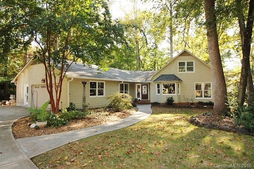 Beautifully updated ranch w/ 3 bedrms on main & 2 bed/Bonus up. Wood flrs & tile thru most of main fl. Gourmet Eat-in Kitch w.granite center island & flat cook top. Custom cherry cabinets! Dbl. Jenn-air ovens, Corian counters. Newly designed Butlers pantry w/sink & laundry rm. Recently added half bath & updated full bath w/custom vanity. Liv rm. Grt rm vaulted ceiling, stone frplc. Dbl. sliding doors to new spacious decks. Master on main w/walk-in oversized shower. Flat lot-trees-Decking 2 car g