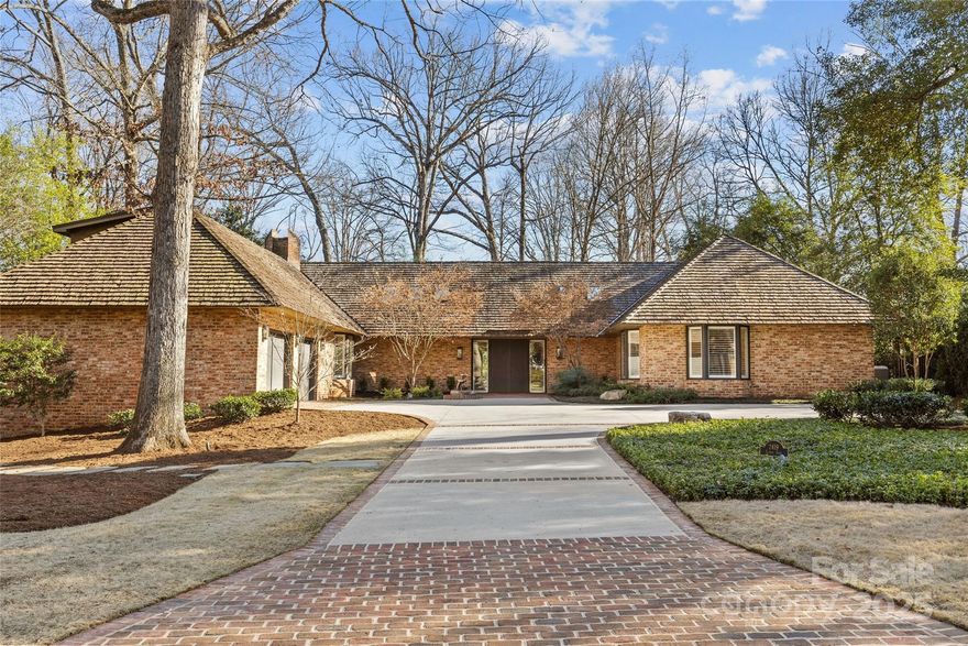 Luxury Living in Foxcroft! Enter into this stunning home and be captivated by the breathtaking three-sided glass room, filling the space with natural light. Designed for effortless entertaining and everyday comfort, the desirable open floor plan seamlessly connects the show-stopping chef’s kitchen to a sunlit dining room. Spacious main level primary suite features a beautiful bathroom and large walk-in closet with built in shelving. Three additional bedrooms and three full bathrooms plus a bonus room and half bath. Extend entertaining outdoors on incredible porch overlooking the private, fenced yard. Move-in ready, this residence perfectly blends luxury & sophistication. Convenient to restaurants & shops in the Southpark area. Easy commute to Uptown.