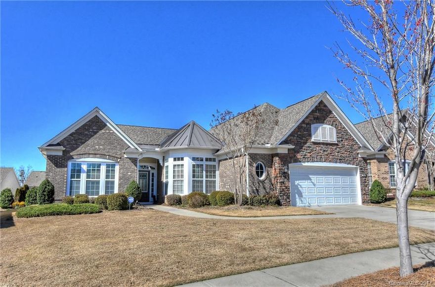 Move-in ready Cumberland Hall with sun room. New roof in 2011. Gleaming hardwood flooring in living areas. Split bedroom plan offers great living. Gourmet kitchen has SS appliances, granite counter tops, & Breakfast Nook.Master Suite has trey ceilings, private bath w/dual sinks, separate garden tub/shower, & walk-in closet. Full irrigation system plus landscaped yard. Easy access to dog park and new Lodge.