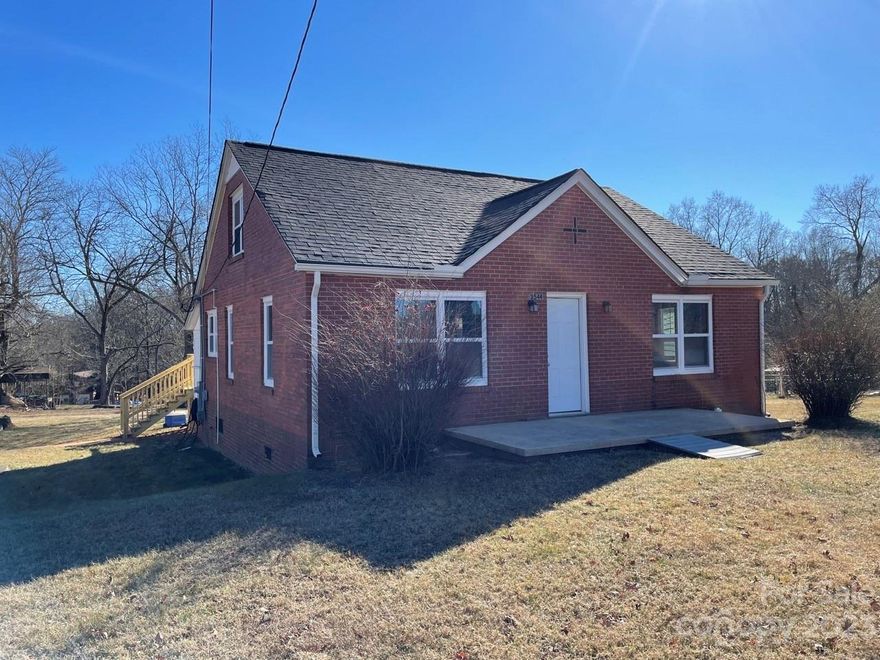 Check out this 4 bedroom/1.5 bath with many new updates sitting on over a half acre.  Large deck overlooking backyard.  Partial basement.  Detached garage with workshop.