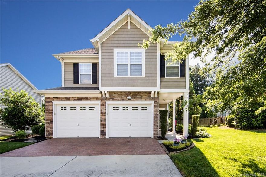 Lucky you! Buyers Lending fell through. Welcome home to a well cared for Whitley Mills Former Model. Hwd flrs on main, surround sound, light & airy eat-in kitchen w/ SS appliances and marble trimmed gas fireplace in family rm. Relax upstairs in your over-sized owners retreat, spacious secondary beds or loft. Enjoy privacy in your wooded backyard oasis complete w/ stone hardscaping, built-in grill, fridge & storage. New AC May 2017. Community Pool.  Ft Mill Schools. Close to shopping & I-77.