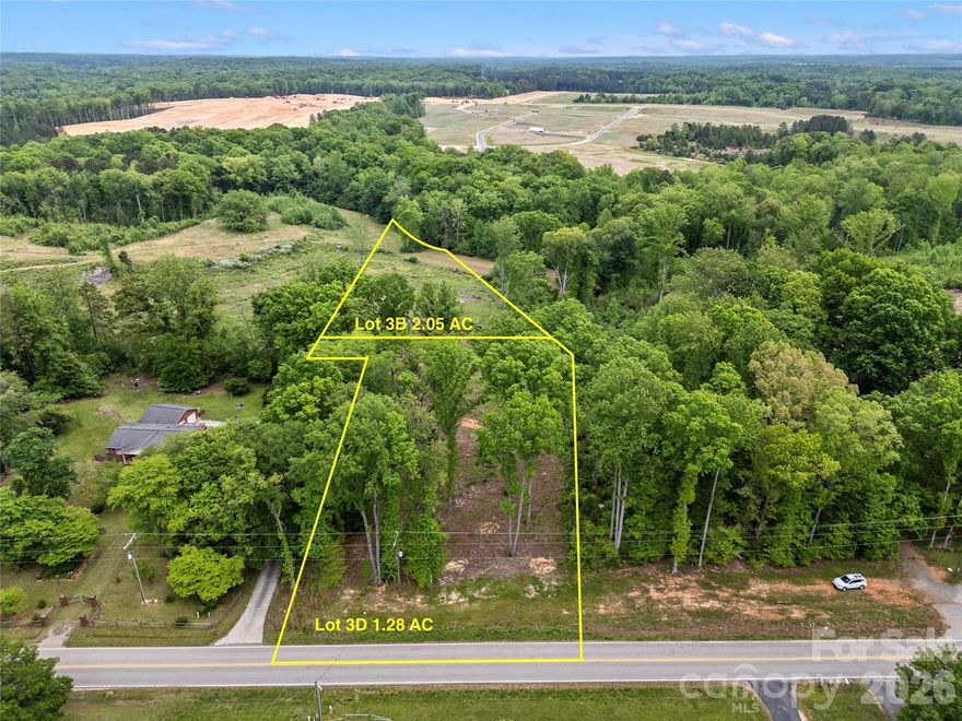 Look no further for your new homesite already perked for a 5 bedroom septic! This 2.05 acre homesite on Henry Harris Rd is a blank canvas ready for you to make it your own. Lot 3B features gentle hills that provide you the prime opportunity for a basement home with endless possibilities. With the lot recently surveyed and perked and permitted for an engineered 5 bedroom system there's no guess work about what you can achieve on this lot. The lot has been mostly cleared making it easy to walk and plan out your vision while also cutting build costs. Lot 3B is just minutes away from Marvin, Waxhaw, Fort Mill, and Ballantyne and only a short commute to downtown Charlotte. With the elevated homesite looking over the preserved Heelsplitter Overlay District you'll always have an abundance of privacy and seclusion! Don't miss this prime land opportunity!
