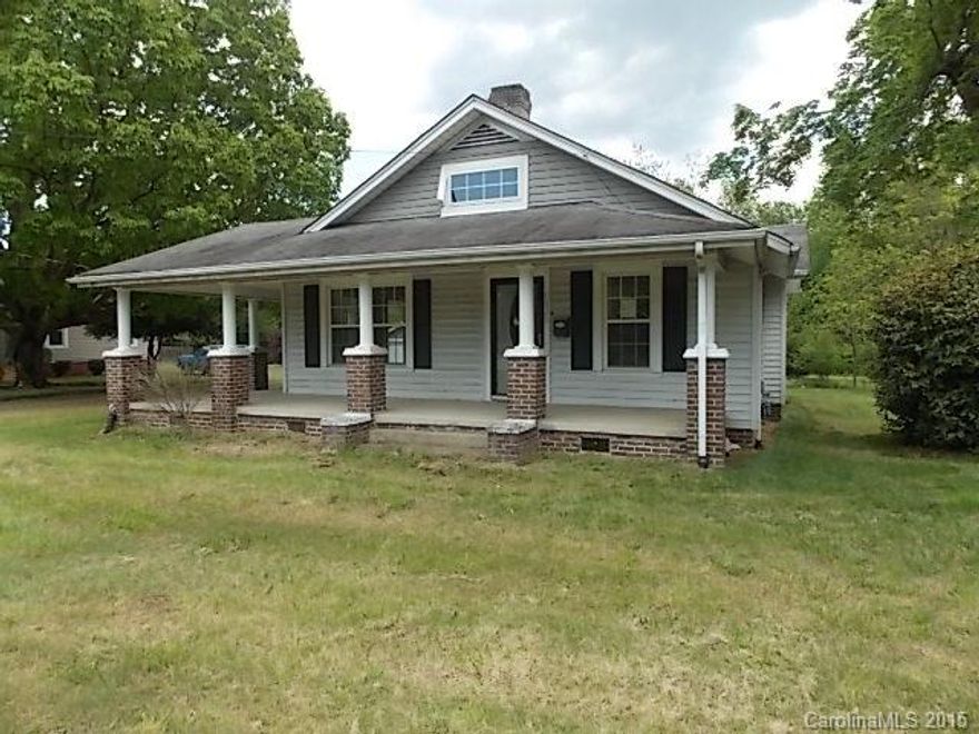 Enjoy the Front Porch on this Spencer Home!  Great location close to High Rock Lake and City of Salisbury Conveniences.  Large Detached Garage/Workshop.  Fireplace and Hardwood flooring in Living area.  Updated Kitchen and Bath makes this Home Special.  Don't miss out on this Nice Home!