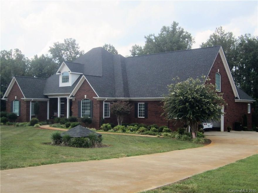 Absolutely Beautiful Brick Home, offers over 6000sf, arched entry, great room w/cathedral ceiling, fireplace w/gas logs, hardwood floors, sunroom, kitchen w/ breakfast area and bar, lots of cabinets, formal dining room, large master bedroom w/ walk out door and private bath w/walkin tile shower & corner tub, bonus room w/half bath, basement has living rm and recreation rm, wood burning fp  and workshop w/ garage door, inground pool, 2 car garage and additional lot available to purchase. $499,900